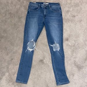 Levi’s 721 busted knee high rise skinny jeans